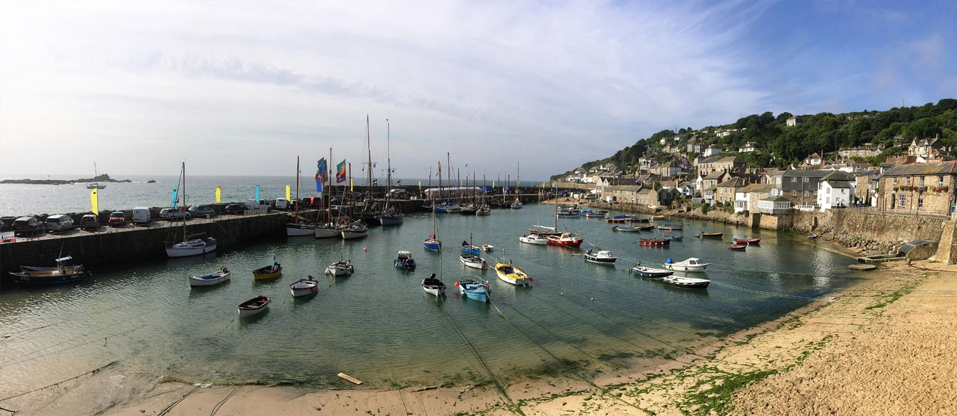 Mousehole harbour and the surrounding village